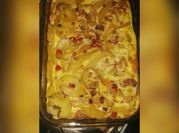 Una foto de tortilla de papa y pechuga de pollo