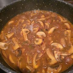 A picture of Mushroom Masala Curry 🍄🍛🌶.