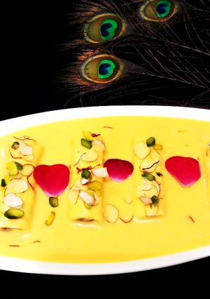 A picture of Mango Rabdi With Chocolate Dry Fruit Roll.