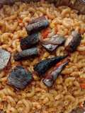 Jollof macaroni with fried boneless fish