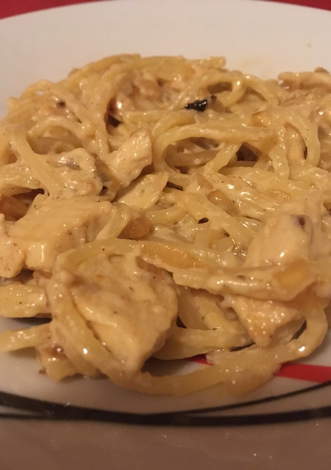 Una foto de Espaguetis a la parmesana