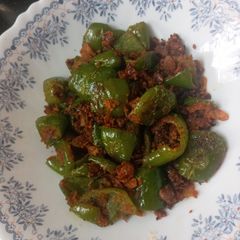 A picture of Capsicum besan bhaji.
