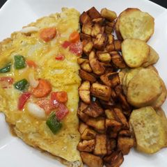 A picture of Fries with omelette.