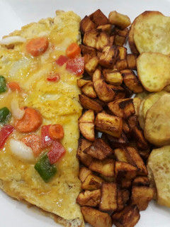 A picture of Fries with omelette.