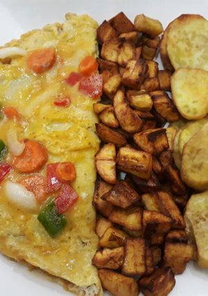 A picture of Fries with omelette.