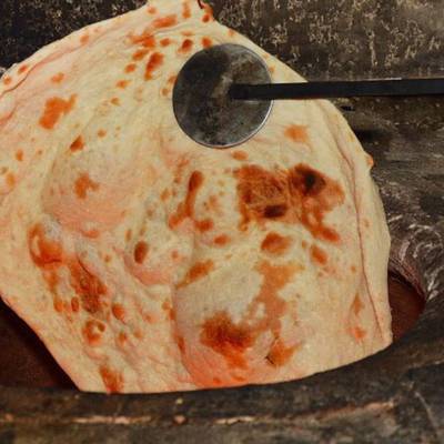 خبز تنور طين عراقي مع السمك المسكوف بالصور من ابو نشوان الصالح - كوكباد