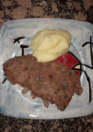 Una foto de Milanesas con Puré de Papas