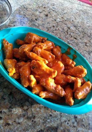 Una foto de Alitas de pollo estilo buffalo (Buffalo Wings)
