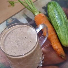 A picture of Healthy protein coconut milk shake with carrot and cucumber.