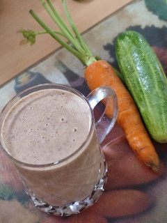 A picture of Healthy protein coconut milk shake with carrot and cucumber.