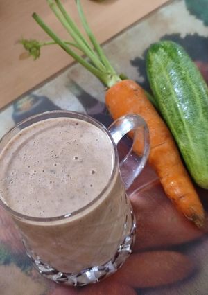 A picture of Healthy protein coconut milk shake with carrot and cucumber.