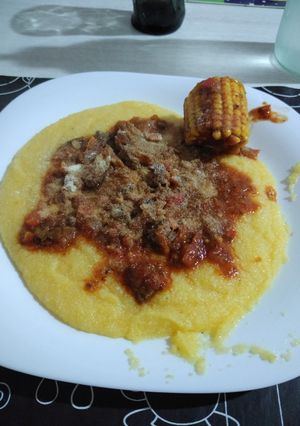 Una foto de Polenta con tuco