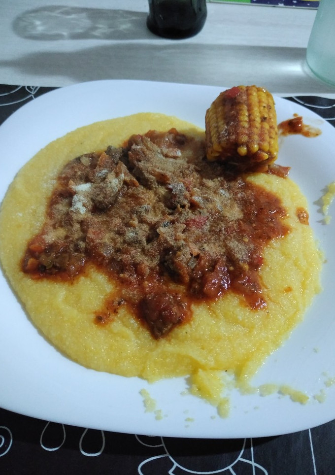 Una foto de Polenta con tuco