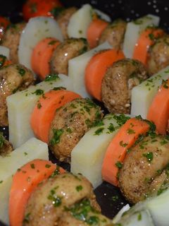 Una foto de Brocheta de Champiñón