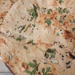 Wheat flour butter garlic naan A picture of Wheat flour butter garlic naan.
