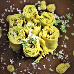 A picture of Panch Phoron Flavoured Stuffed Khandvi (Pressure Cooker Method - Fusion Style).