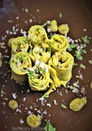 A picture of Panch Phoron Flavoured Stuffed Khandvi (Pressure Cooker Method - Fusion Style).