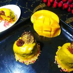 A picture of Mango chocolate mousse cupcake.