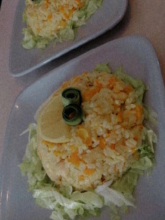 Una foto de Pollo al arroz con curry