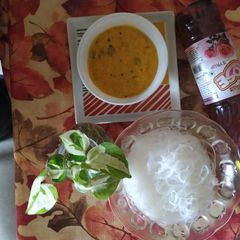 A picture of Falooda, kesar badam pista rabri and syrup.