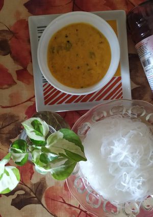 A picture of Falooda, kesar badam pista rabri and syrup.