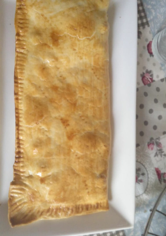 Una foto de Empanada de pollo al curry