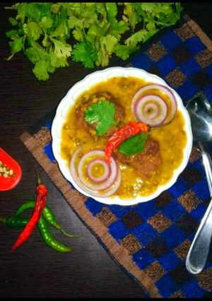 A picture of Moong daal tadka with vadi.