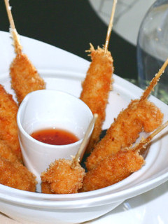 Una foto de Brochetas de Langostinos