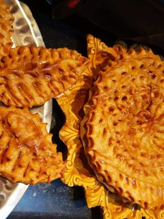 কমলা - ক্ষীরের  নকশি পিঠা (kamola kheerer nakshi pitha recipe in Bengali) রেসিপির প্রধান ছবি