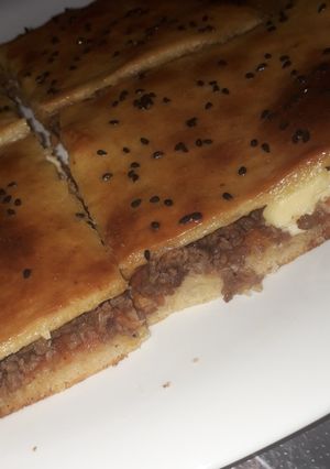 صورة لوصفة كوكا اللحم المفروم بالعجينة القطنية