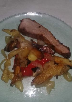 Una foto de Marucha al asador con papas a la plancha