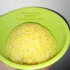 A picture of Nasi Kuning Sederhana (Simple Indonesian Yellow Rice).