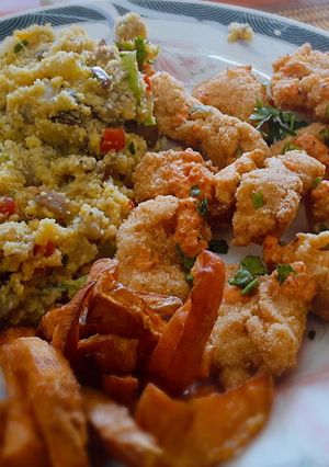 Una foto de Cus cus con chicharrón de pollo