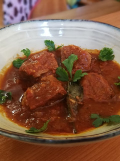 Una foto de Magro de cerdo en salsa de tomate
