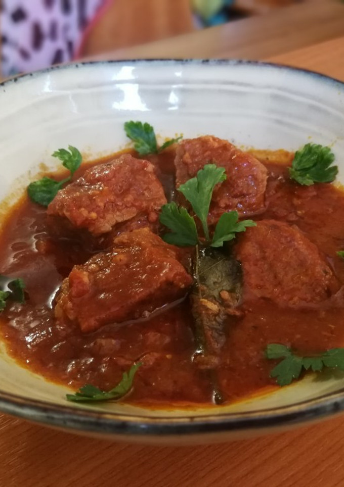 Una foto de Magro de cerdo en salsa de tomate