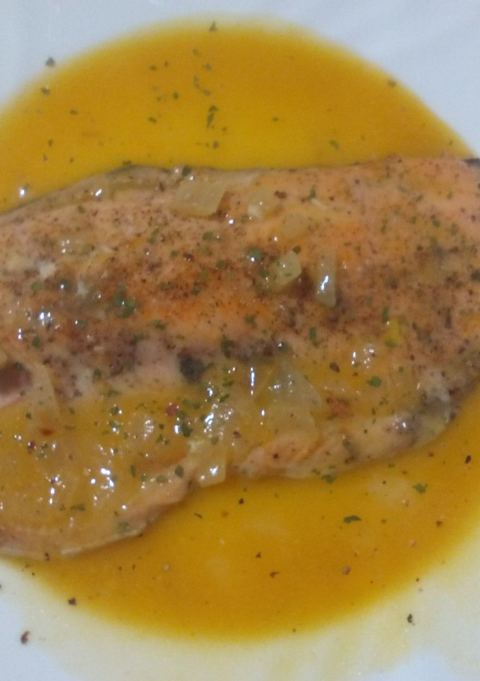 Una foto de Truchas asalmonadas con salsa de naranja