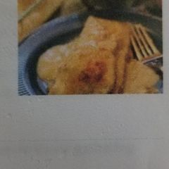 A picture of White chicken enchiladas.