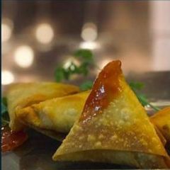Achari Aluu smoke samosa A picture of Achari Aluu smoke samosa.