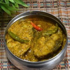 A picture of Steamed fish with mustard sauce.