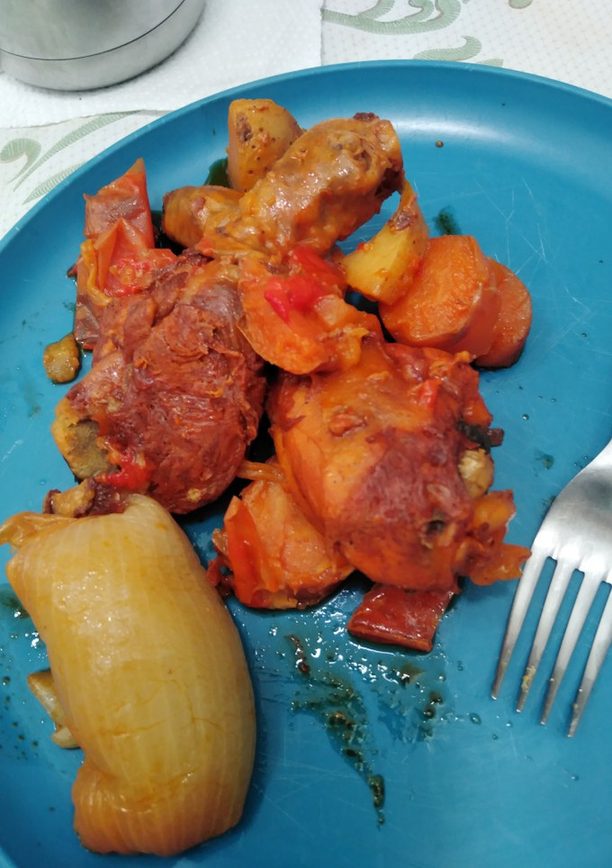 Una foto de Pollo encebollado con curry