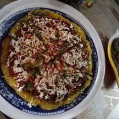 A picture of Poha Paneer Pizza.