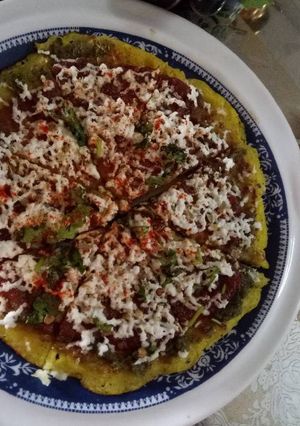 A picture of Poha Paneer Pizza.