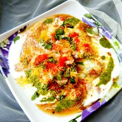 Dahi bhalla in sandwich maker A picture of Dahi bhalla in sandwich maker.