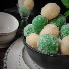 A picture of White and Green Coconut mithai.