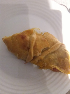 Una foto de 🦪 Empanada vegetariana 🧅🍅🫑