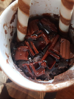 A picture of Wheat flour chocolate mug brownies.
