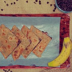 A picture of Banana and chocolate stuffed paratha.