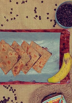 A picture of Banana and chocolate stuffed paratha.