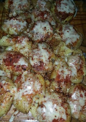 Una foto de Papas a la pizza 
