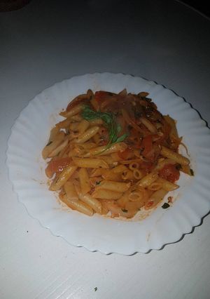 Una foto de Pasta con cebolla y tomate